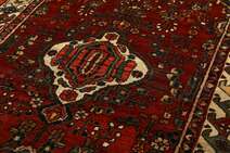 
    Hosseinabad - Dark red - 133 x 204 cm
  