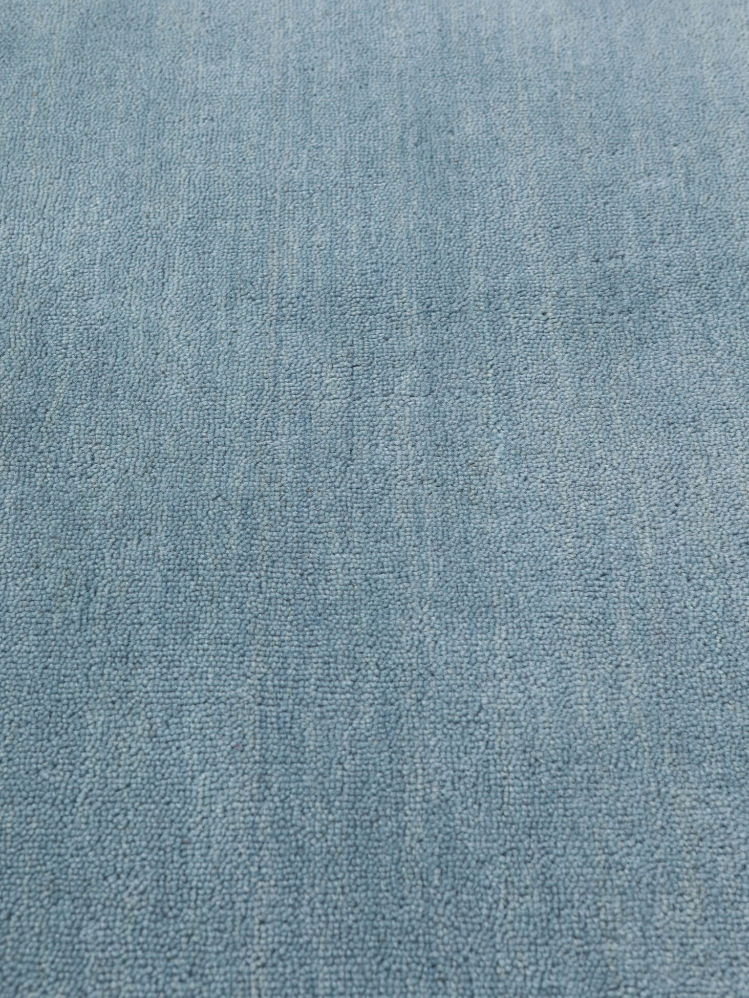 
    Handloom - Light blue - Ø 100 cm
  