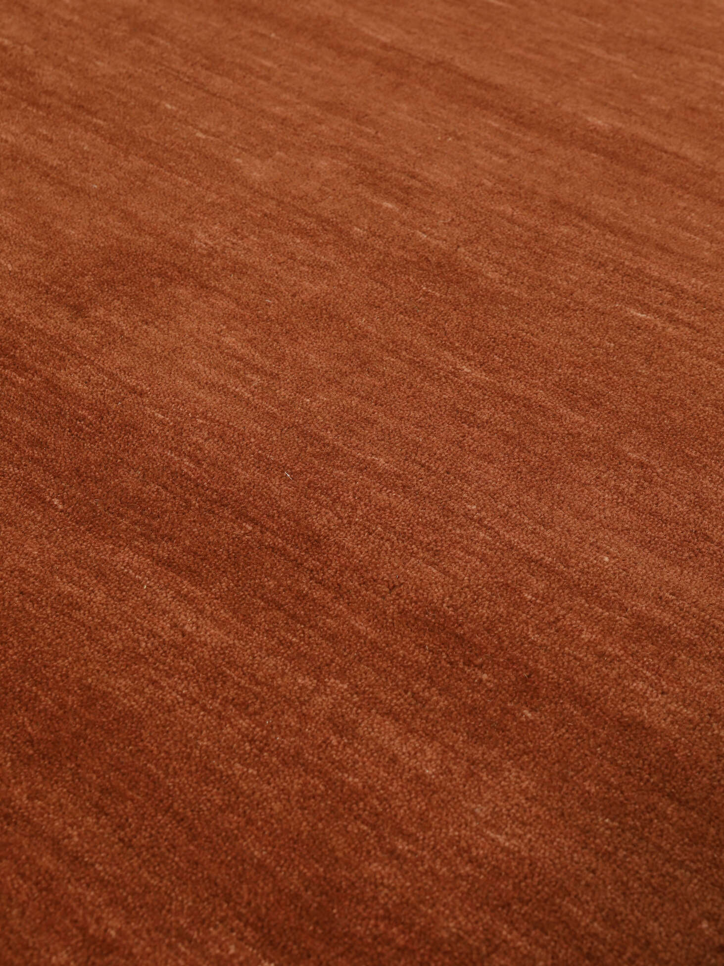 
    Handloom fringes - Rust red - 160 x 230 cm
  