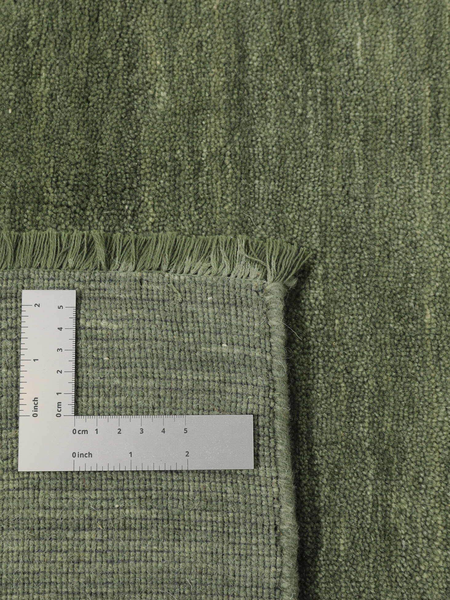 
    Handloom fringes - Forest green - 100 x 160 cm
  