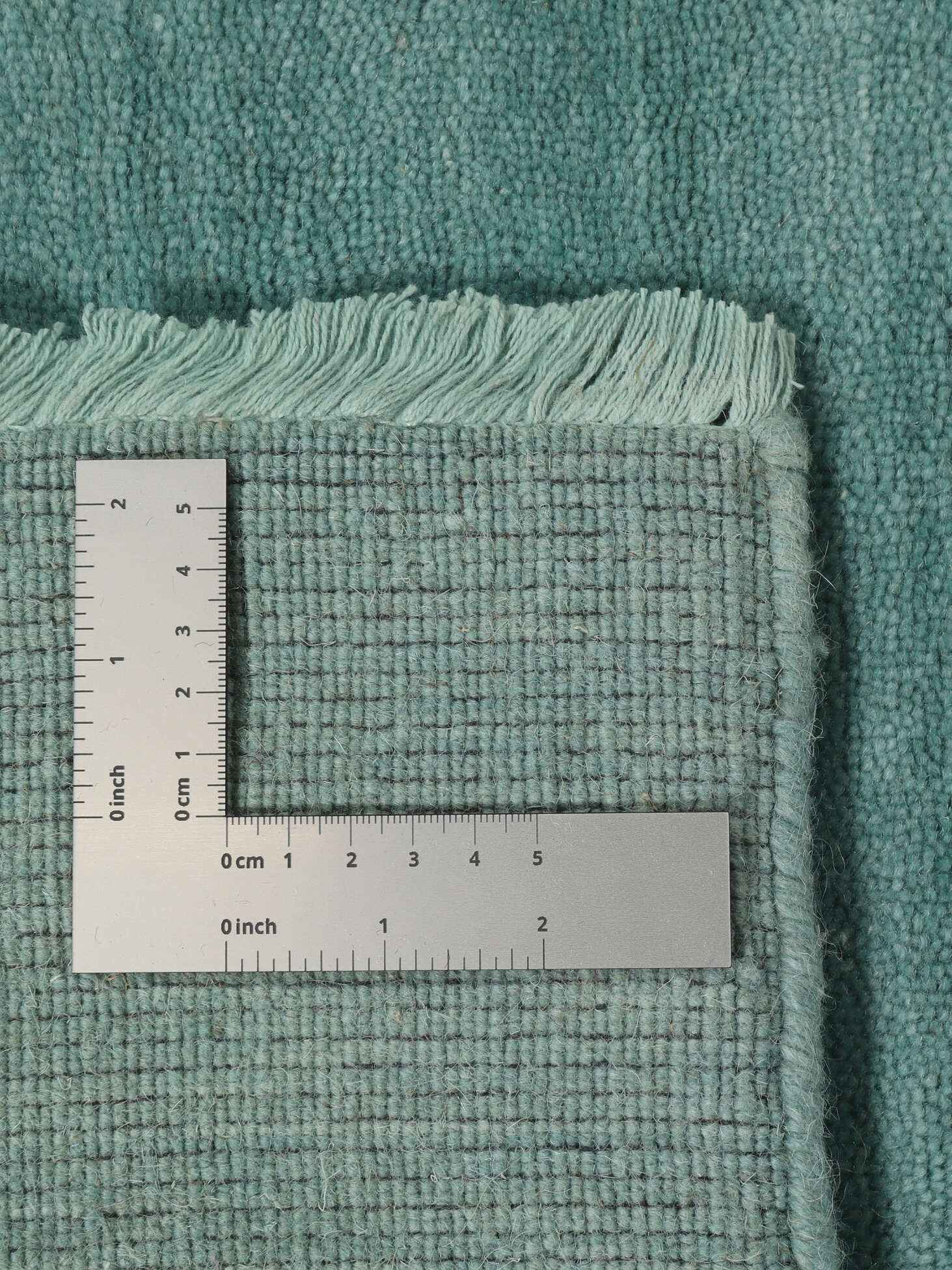 
    Handloom fringes - Turquoise - 160 x 230 cm
  