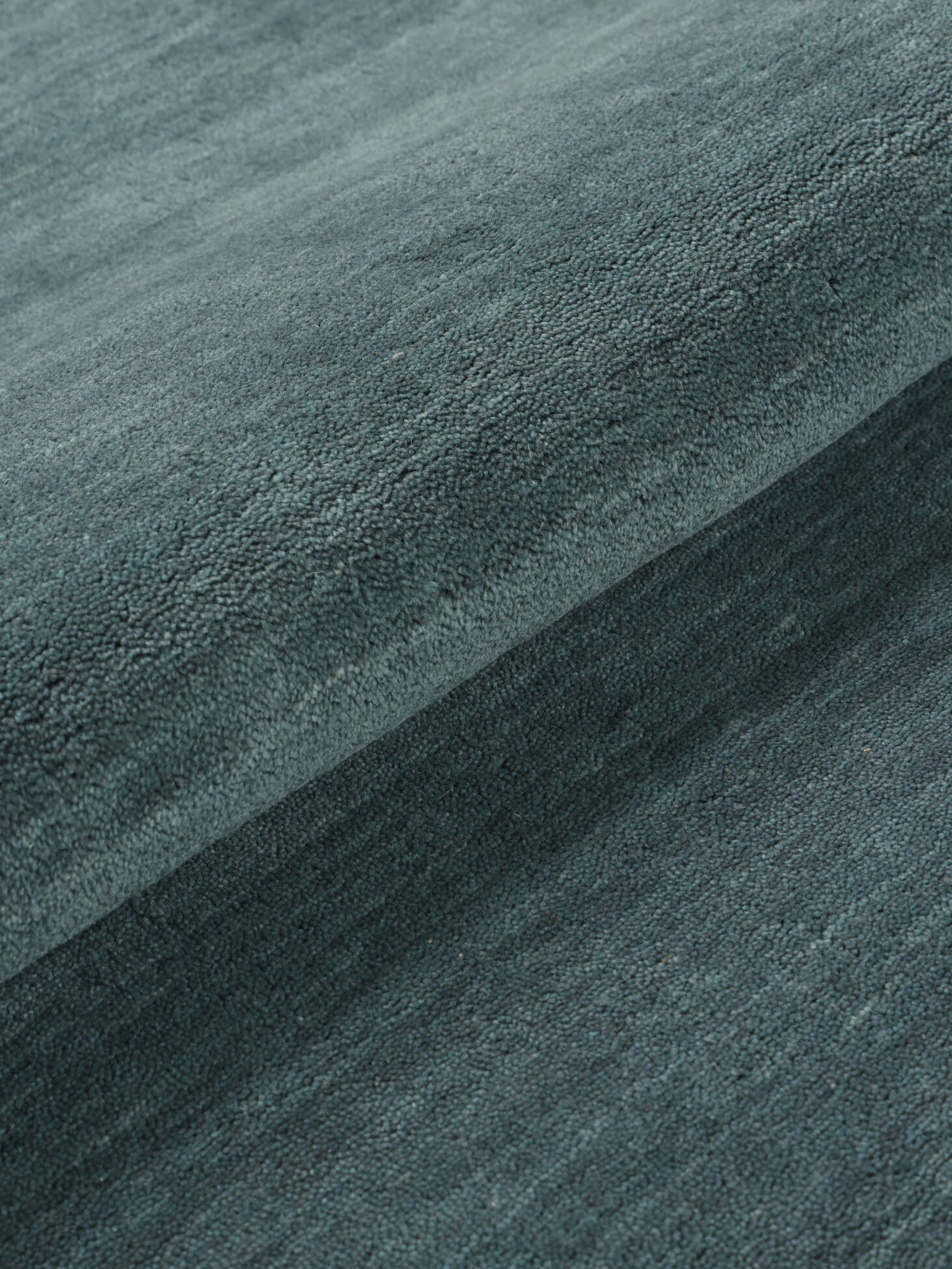 
    Handloom - Dark teal - Ø 200 cm
  