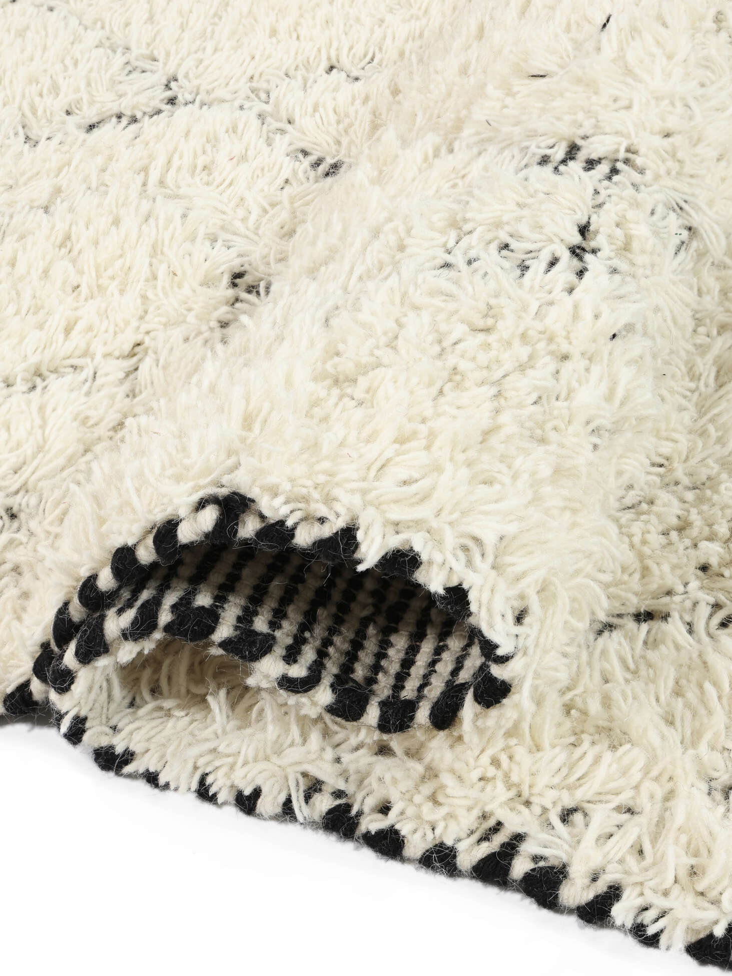 Le tapis touffeté damier apaisant 120 x 180 cm