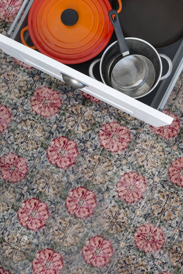 Pink  colored vintage - turkiet -  Carpet in a kitchen.