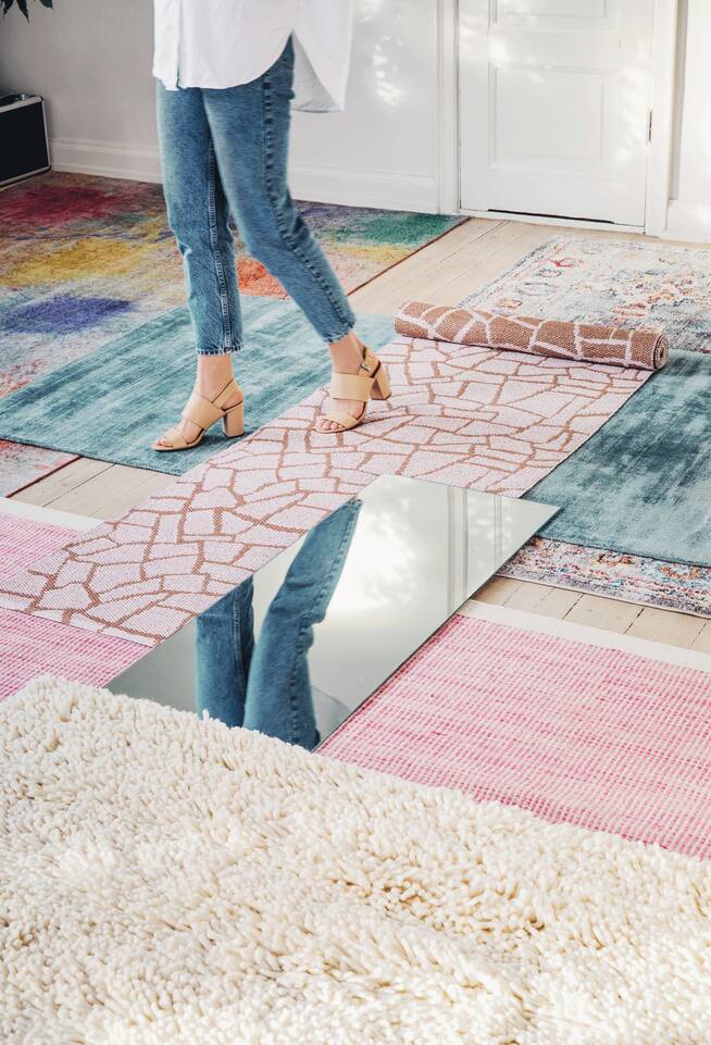 Pink runner plastic -  Carpet in a living room.