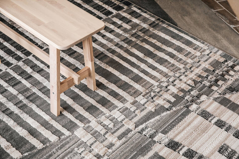 Black / grey  a-w noble -  Carpet in a living room.