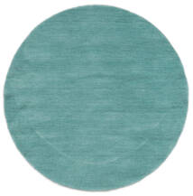 Handloom Ø 100 Lille Turquoise Enkeltfarvet Rundt
 Uldtæppe