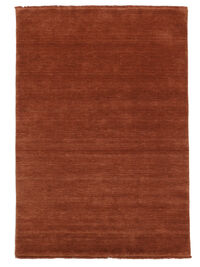 
    Handloom fringes - Rust red - 200 x 300 cm
  